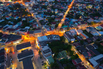 Aerial view of residential neighborhood roofs. Urban housing development from above. Top view. Real...