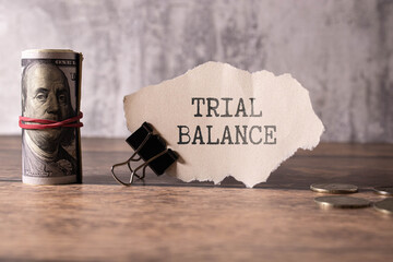 Trial Balance text written on a notebook with pencils