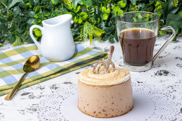 Fruit dessert and coffee on a natural background