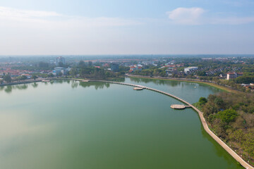 Fototapeta premium Aerial view of local residential neighborhood roofs. Urban housing development from above. Top view. Real estate in Isan, Khon Kaen urban city town, Thailand. Property real estate.