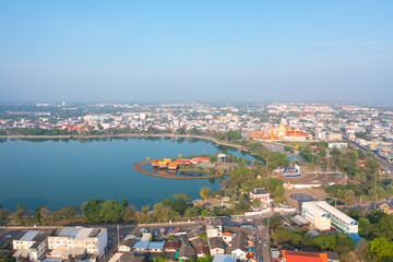 Naklejka premium Aerial view of local residential neighborhood roofs. Urban housing development from above. Top view. Real estate in Isan, Khon Kaen urban city town, Thailand. Property real estate.