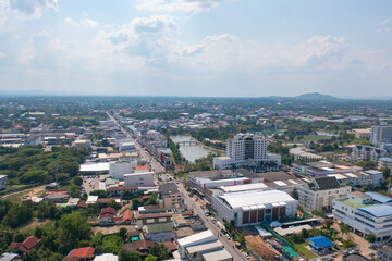 Aerial view of local residential neighborhood roofs. Urban housing development from above. Top view. Real estate in Isan urban city town, Thailand. Property real estate.
