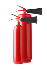 Fototapeta premium Two red fire extinguishers on white background