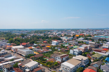 Aerial view of local residential neighborhood roofs. Urban housing development from above. Top view. Real estate in Isan urban city town, Thailand. Property real estate.