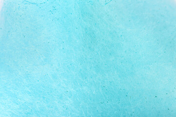 Light blue cotton candy as background, closeup