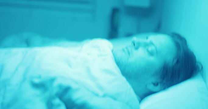 Man sleeping earthquake blue lights alien abduction ghost bedroom medium