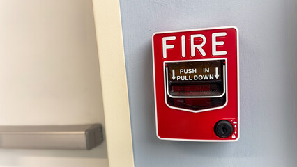 Vivid fire alarm, a symbol of urgency and safety, warns of danger, evoking preparedness and...