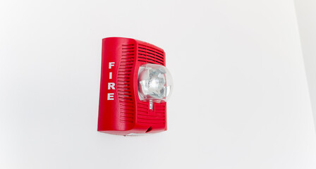 Vivid fire alarm, a symbol of urgency and safety, warns of danger, evoking preparedness and...