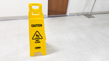 Yellow caution sign: Symbol of warning and alertness; vibrant hue signifies potential hazards,...