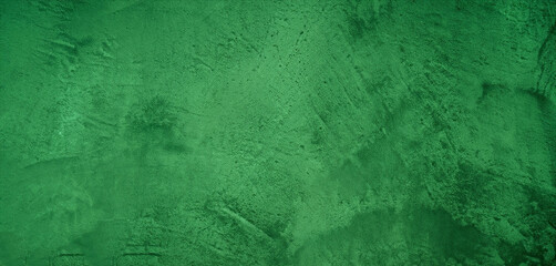 Abstract dark green Wall Background. Beautiful Grunge virid Stucco Backdrop. Decorative Concrete Texture With Copy Space For Design