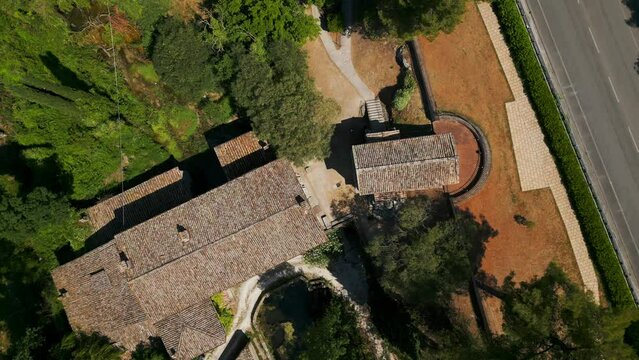 Aerial Birds Eye View Over Roof Of Temple of Clitumnus Beside Via Virgilio, 139. Ascending Spinning Shot