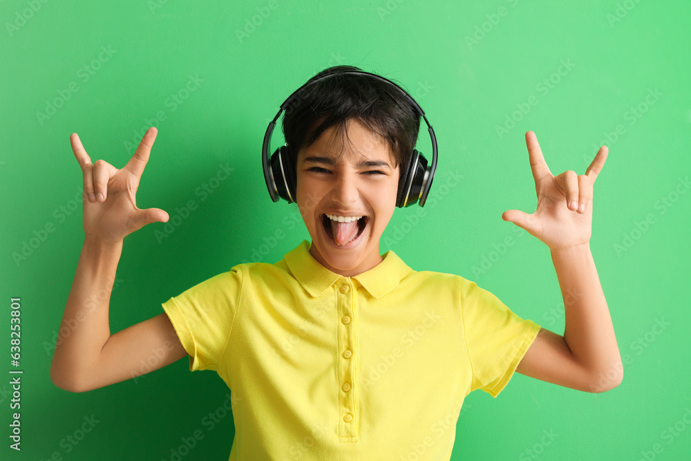 Canvas Prints Little boy in headphones showing 