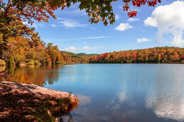 Tuinposter View of Price Lake in Julian Price Park on Blue Ridge Parkway near Blowing Rock, North Carolina in fall season. © Chansak Joe A.