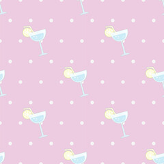 a repeating pattern of light blue martini glasses with a yellow lemon or lime wedge on the rim. The background is light pink with small white polka dots scattered across it