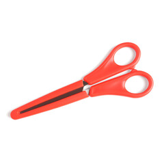 Red scissors on white background