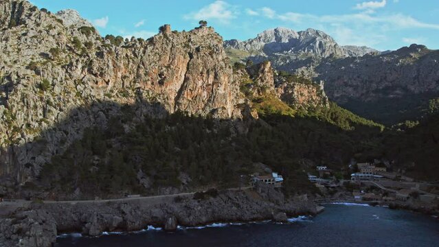 Serra Tramontana Mountain Range At Sa Calobra Coastal Town In Balearic Island Of Mallorca, Spain. Aerial Shot

