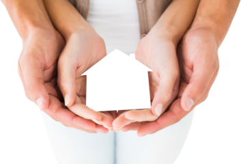 Digital png photo of hands of caucasian couple holding house on transparent background