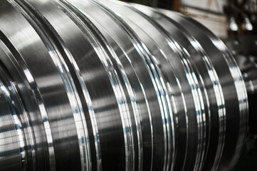 Fototapeta premium Steam turbine shaft with fir-tree blade fastening at plant