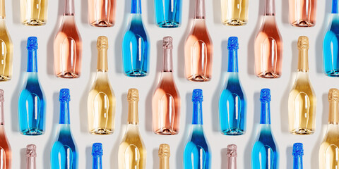 Colorful banner of bottles of sparkling wine, colored glass bright champagne bottle as texture background. Festive Summer alcohol drinks, happy holidays beverage wallpaper, top view pattern