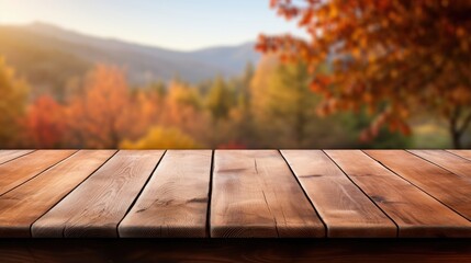 Naklejka na ściany i meble empty wooden table rustical style for product presentation with a blurred autumn landscape in the background