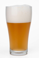 A glass of beer. Cold Light Craft Beer in a glass isolated on white background. Craft Beer Pint
