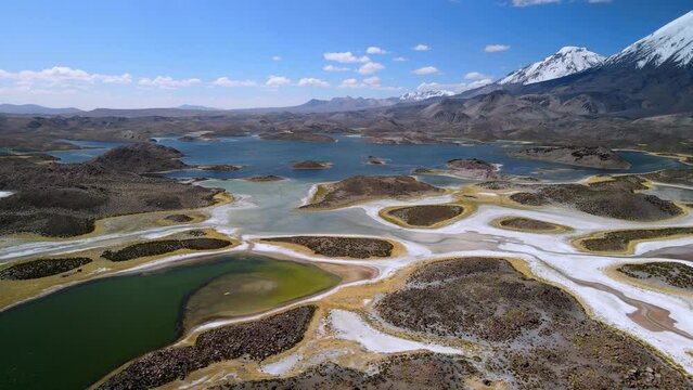 Aerial view of Cotacotani Lagoon, Lauca National Park in Chile - dolly forward, drone shot