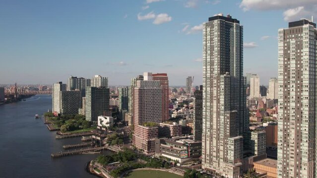 Luxury high-rises in New York's LIC neighborhood, 4K aerial.