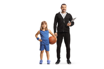 Girl with a basketball standing with her coach
