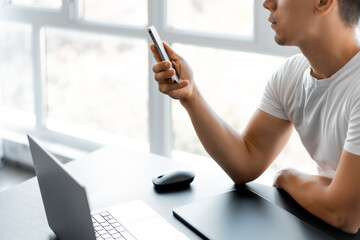 man at work at home, freelancer, search for orders