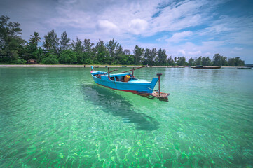Traditional long tail boat in the sea, Bintan Island, Indonesia - 638314276