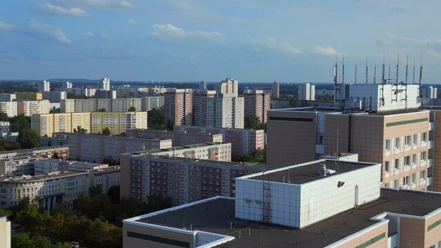 Breathtaking aerial top view flight 
Large panel system building Apartment, prefabricated housing complex, Berlin Marzahn East German summer 2023. very close passing flight drone
4k cinematic