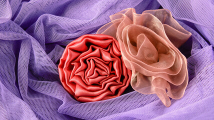  pink rose-shaped brooch made of cloth