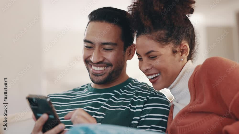 Wall mural Happy couple on sofa with phone, laughing at social media meme or funny internet video in home together. Relax, man and woman on couch with smartphone, checking comic online post or joke on website.