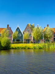 A row of houses in the Netherlands. Old buildings. Architecture and construction. Photo for background and wallpaper.