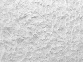 White wall surface of the white stone texture rough, gray tone. Use this for wallpaper or background image rock backdrop. There is a blank space for text.