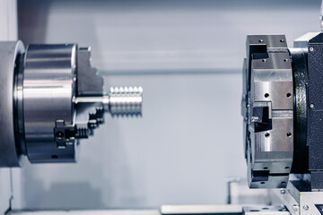 Macro Machine iron tools CNC cut of metal with light spark, technology modern industrial