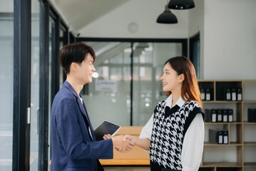 Business partnership handshake concept.Photo two coworkers handshaking process.Successful deal after great meeting..