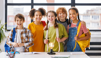 Portrait of  students schoolchildren during lesson.