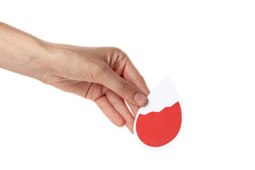 PNG,a paper drop of blood in the hand. Blood donation,isolated on white background