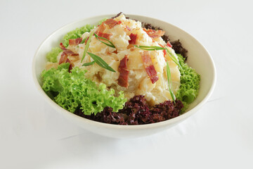 chef handmade potato salad with bacon and tartar salad sauce in lettuce bowl on white background appetiser Christmas festival party halal food hotel cuisine restaurant menu