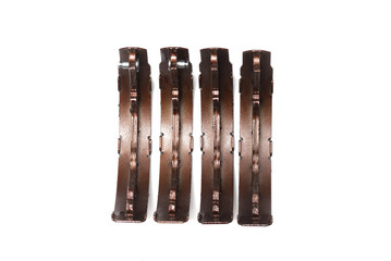 Car rear brake pads isolated on the white background. Top view.