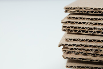 Сraft cardboard laid out on a light background.