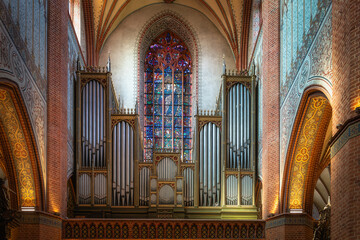Closeup on the pipe organs in Church of the Assumption of the Blessed Virgin Mary, Cathedral Basilica in Pelplin, Poland