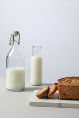 Breakfast tasty food concept - milk with bakery products