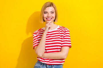 Photo of cheerful adorable girl wear stylish striped clothes arm touch face creative idea isolated...