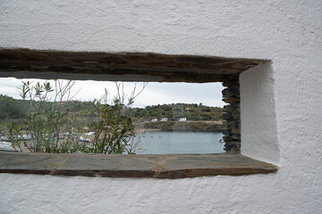 Landscape of garden window of Casa Dali during summer in Port Lligat Catalonia