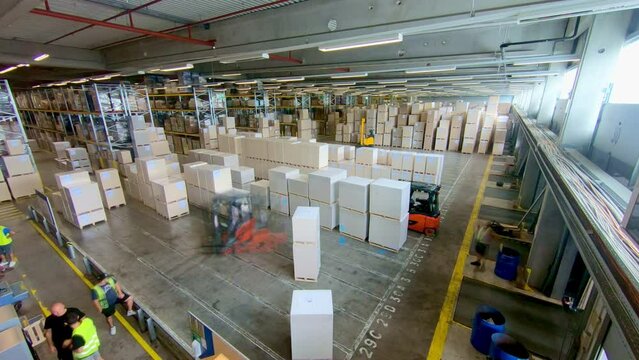 Freight shipping center warehouse employees operating forklift and sorting container timelapse top view. Storehouse workers driving lift truck and transporting boxes time lapse high angle view