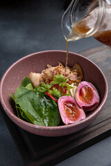 A delicious soup in a restaurant. Close-up