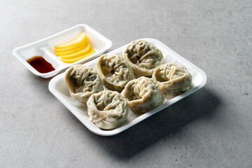 Korean food dish Cold noodles, spicy noodles, meat dumplings, kimchi dumplings, charcoal bulgogi, yukgaejang