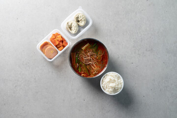 Obraz na płótnie Canvas Korean food dish Cold noodles, spicy noodles, meat dumplings, kimchi dumplings, charcoal bulgogi, yukgaejang